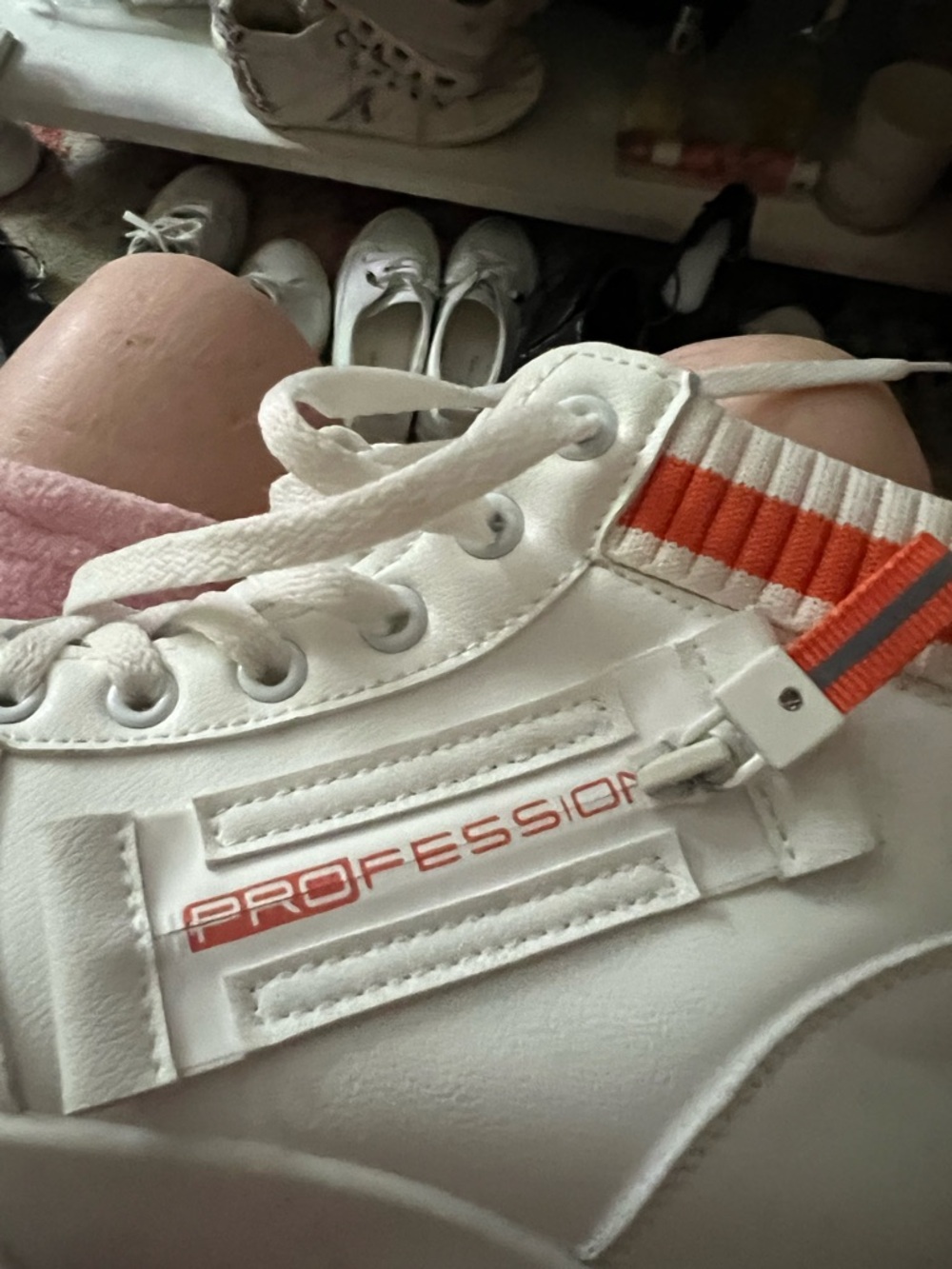 White Sneakers with Orange Stripe and 'PROFESSION' Accent